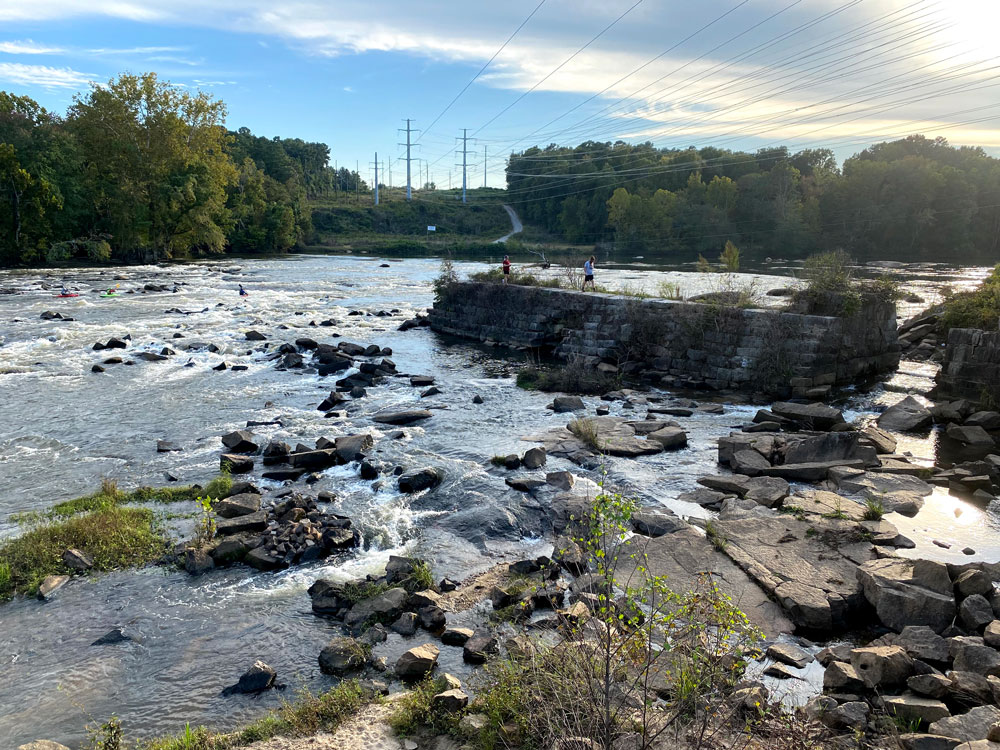 River with rocks and blue sky
